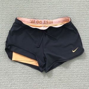 Nike gray and orange shorts with spandex